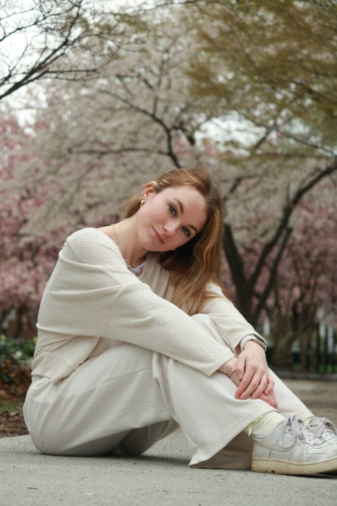 Portrait of woman seated outdoors